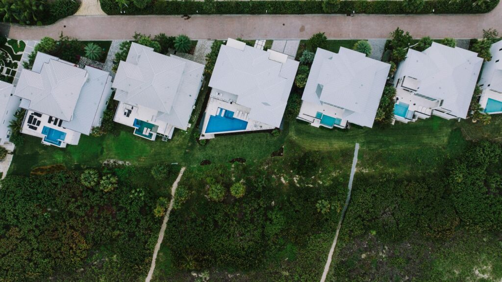 Aerial shot showcasing modern homes with pools in Fort Pierce, Florida neighborh