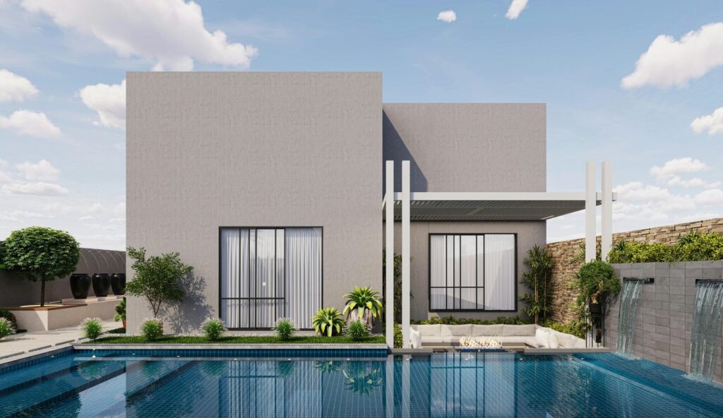 Contemporary villa showcasing sleek architecture, a tranquil pool, and serene la